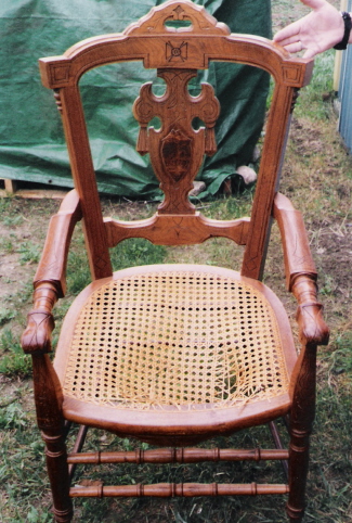 chair with damaged caning